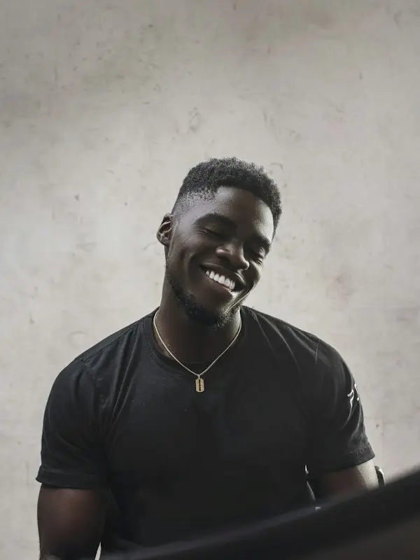 Young man with a big smile